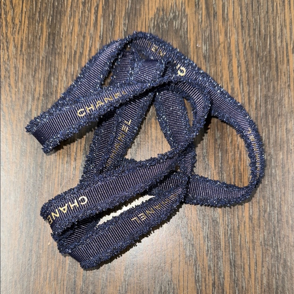 CHANEL Midnight Blue Ribbon with Gold lettering.
